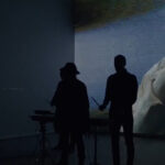 Videoclip y visuales del tema 'Driving in Nails' del grupo musical Archive.