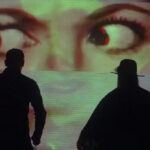 Videoclip y visuales del tema 'Driving in Nails' del grupo musical Archive.